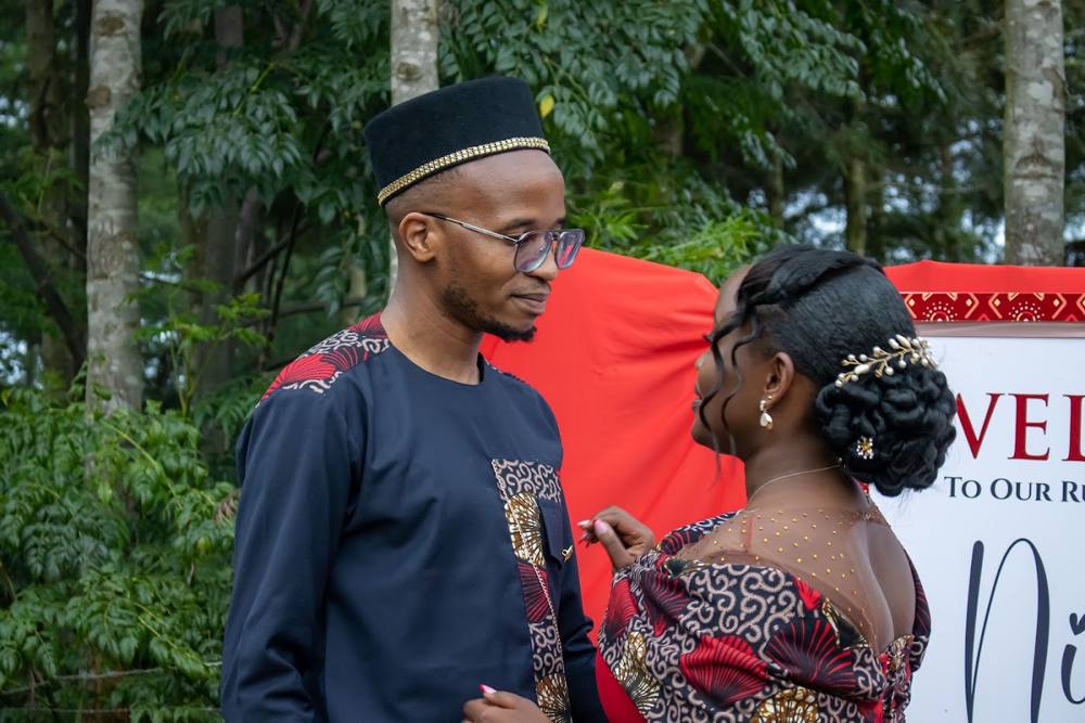 A couple in coordinated African-print outfits made by LoLo Fashion House